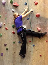 Heather on climbing wall