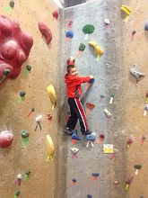 Jack Stathatos on climbing wall
