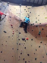 Jen Stathatos on climbing wall
