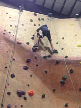 Nick Stathatos on climbing wall