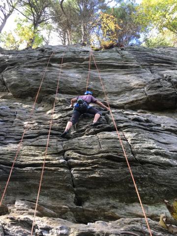 climbing high cliff